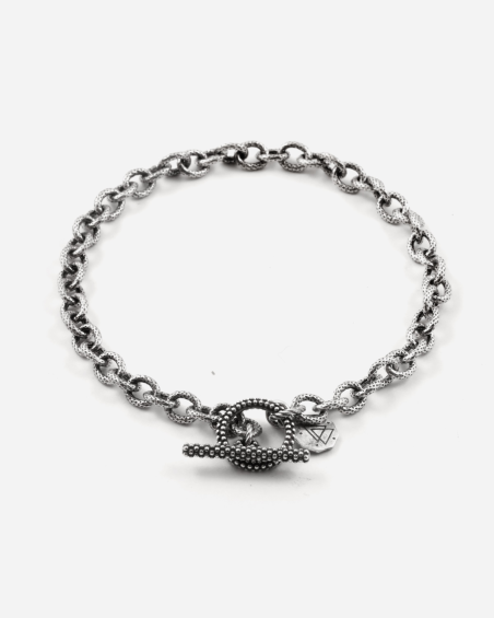 BRACCIALE CATENA RIGATA CON T-BAR PUNTINATA IN ARGENTO